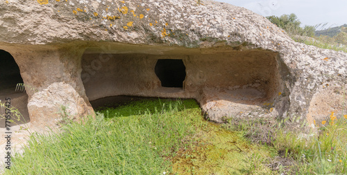 domus de janas and necropolis of santu pedru ancient nuragic tombs in alghero north sardinia. photo