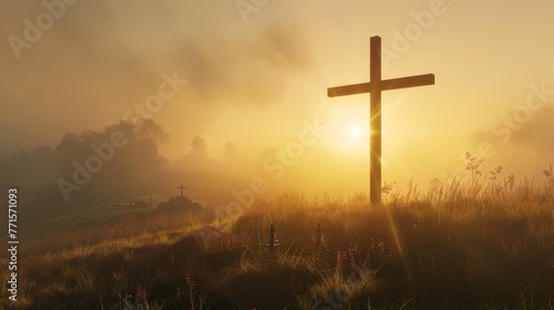 Underneath soft lighting, a Christian cross adorns the hill.