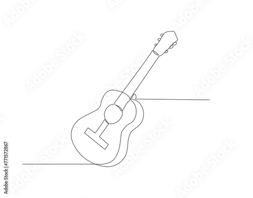 Continuous line drawing of classic acoustic guitar. One line of guitar acoustic. Modern stringed music instruments concept continuous line art. Editable outline.