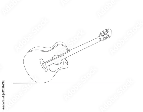 Continuous line drawing of classic acoustic guitar. One line of guitar acoustic. Modern stringed music instruments concept continuous line art. Editable outline.