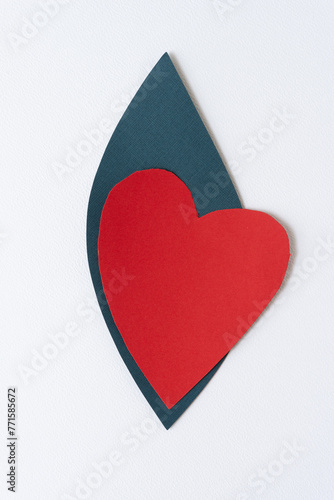 Принти на полотні stylized paper heart with irregular cusps and body on a blue shape