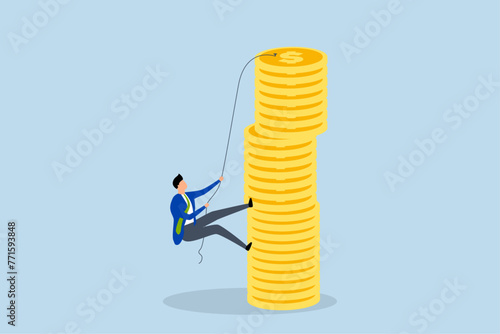 Financial goal, businessman is trying to reach the top of a stack of coins with a hard climbing rope.