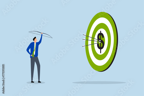 Financial target, businessman Archer hits a dart board 