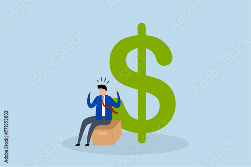 Unemployment, depressed unemployed businessman sitting on cardboard with big dollar
