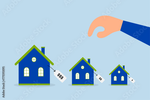 House affordability calculation, businessman wisely chooses the price of the houses of different variants. photo