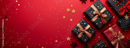 Chic Black and Red Presents with Gold Stars on Festive Red Backdrop