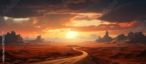 A road cuts through a desert ecoregion at sunset, with mountains in the background under a colorful sky filled with clouds and the afterglow of dusk