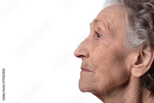 Profile portrait of elderly woman with wrinkled skin Isolated on white background