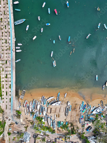 Photos Vertical Cenital View of Paseo del Pescador and Manzanillo Beach Damage