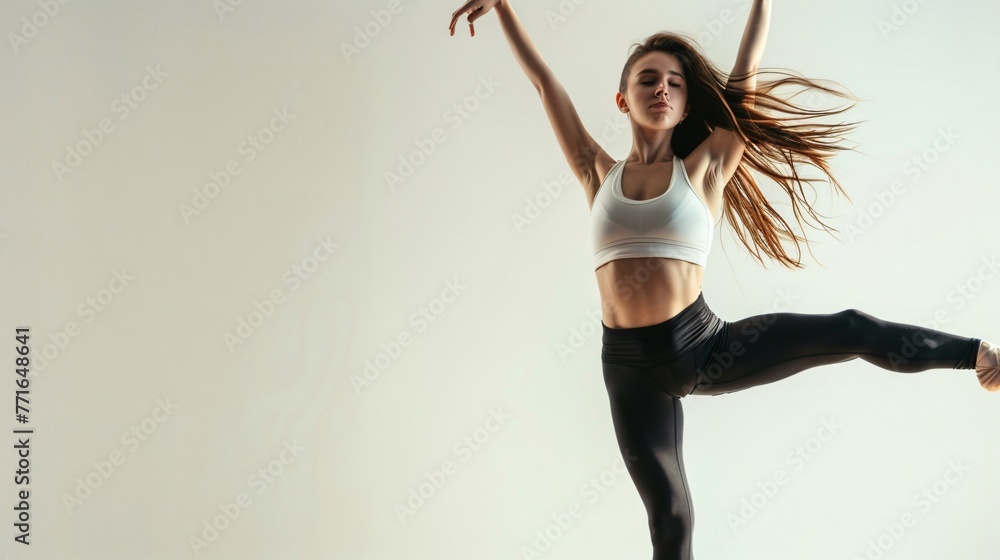 Woman doing ballet, studio photo Woman doing ballet, studio photo