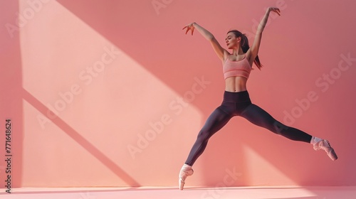 Woman doing ballet, studio photo
