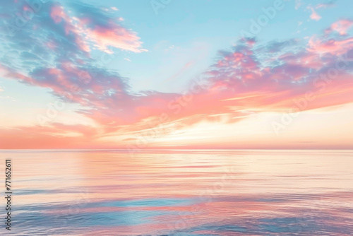 A beautiful sunset over the ocean with pink and orange clouds in the sky