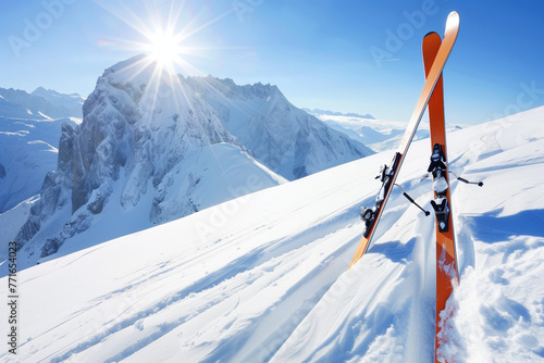 Ski equipment against snowy mountain backdrop