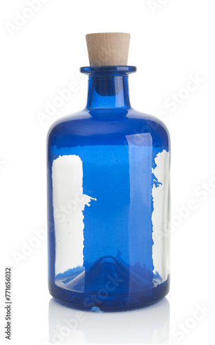 Empty, vintage bottle close up on a white background