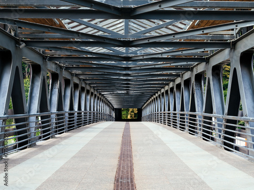 pedestrian bridge with metal structure in the city