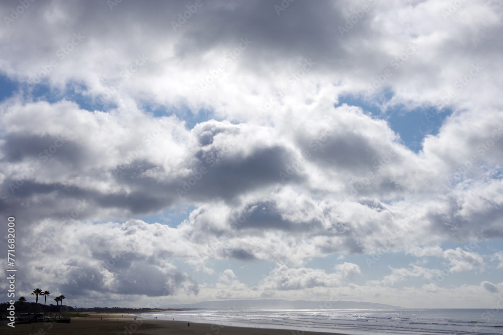 Storm clouds over the beach and ocean on a California winter day