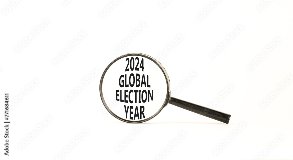 2024 global election year symbol. Concept words 2024 global election year on beautiful magnifying glass. Beautiful white table white background. Business 2024 global election year concept. Copy space 2024 global election year symbol. Concept words 2024 global election year on beautiful magnifying glass. Beautiful white table white background. Business 2024 global election year concept. Copy space