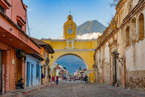 The Santa Catalina Arch in Antigua, Guatemala with Volcan de Agua in the background. photo