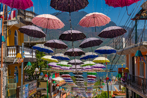 Umbrellas strung above the streets of Lake Atitlan.