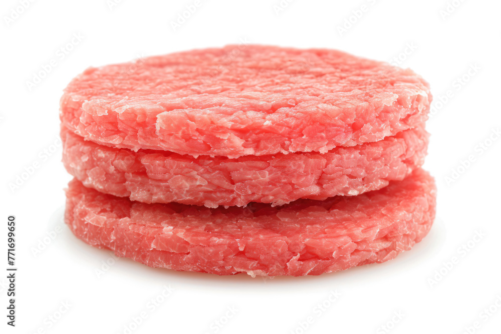 Stack of fresh raw burger patty isolated on white. Stack of fresh raw burger patty isolated on white.