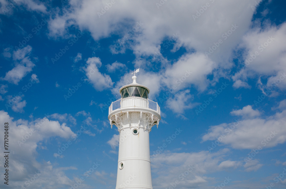 lighthouse on a blu sky