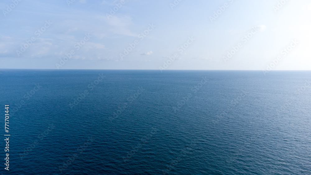 Obraz premium The boundary between clean and turbid water in the middle of the sea. Patobong, South Sulawesi Indonesia. March 30 2024
