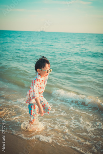 Asian Boys Running around on the beach © grooveriderz