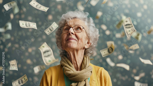 Elderly woman with falling money backdrop - An elderly lady looks up with a hopeful expression as cash notes rain down around her, symbolizing wealth or retirement