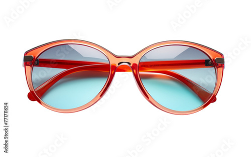 Bright red sunglasses with striking blue lenses resting on a flat surface