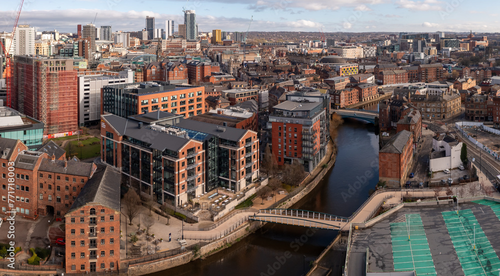 Fototapeta premium Aerial view of redeveloped warehouses along The Leeds to Liverpool canal in Leeds city centre
