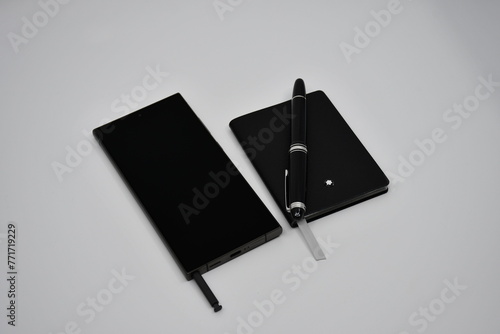 Luxury Smartphone and luxury notebook with pen