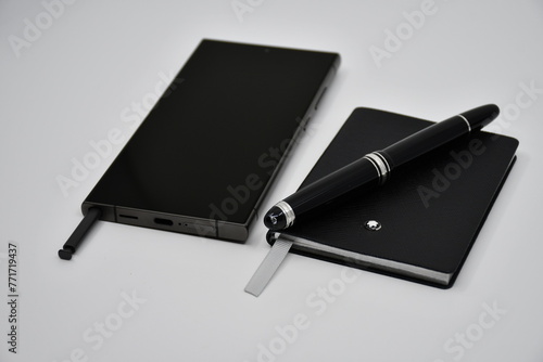 Luxury Smartphone and luxury notebook with pen