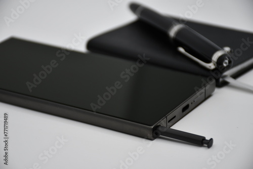Luxury Smartphone and luxury notebook with pen