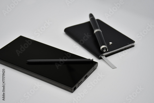 Luxury Smartphone and luxury notebook with pen