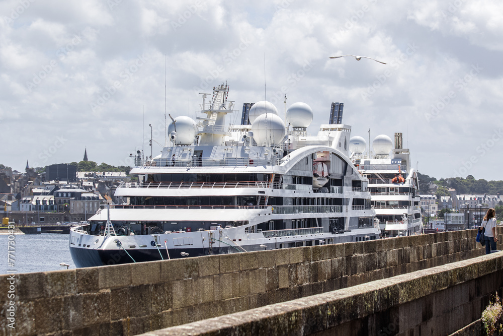 Luxury Cruise Ship Docked in Picturesque Coastal Town