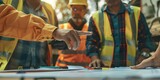 Supervisor pointing at document during safety audit with industrial workers selective focus on hands. Concept Industrial Safety, Supervisor, Audit, Worker, Hands, Focus