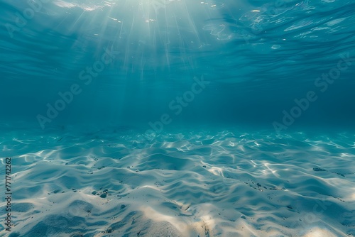 Underwater blue ocean wide panorama background with sandy sea bottom . © crescent
