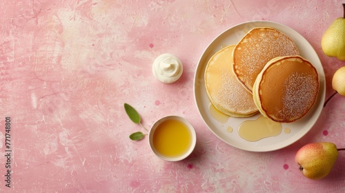  White plate, pancakes, tea, pears, pink tablecloth