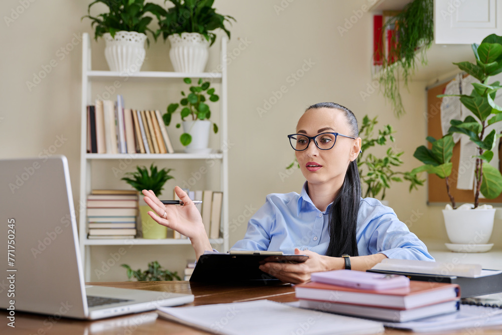Woman psychologist mental therapist working remotely using computer for online therapy Woman psychologist mental therapist working remotely using computer for online therapy