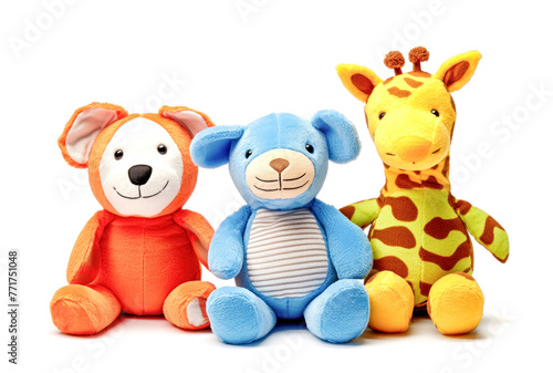Three stuffed animals  a giraffe  a blue bear  and an orange bear