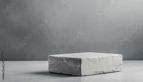 Rough stone podium for presentation. Abstract podium for presentation. Gray background