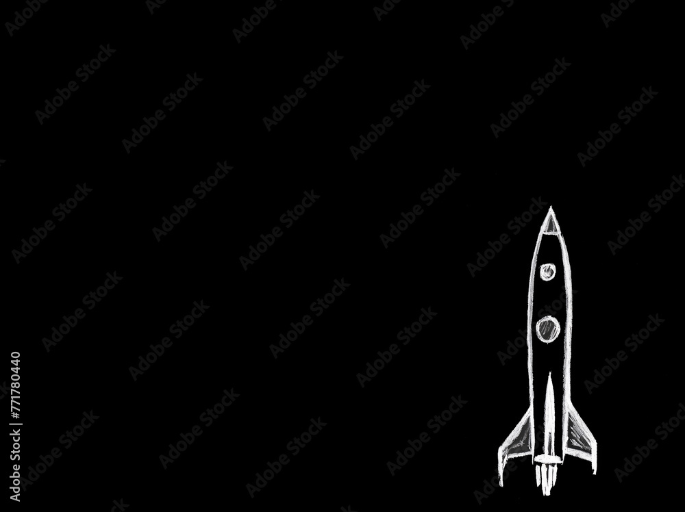 a black blackboard with a rocket painted on it in chalk a black blackboard with a rocket painted on it in chalk