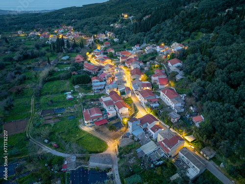 Beautiful view of klimatia  village by  night in corfu island, Greece, Aerial drone view photo