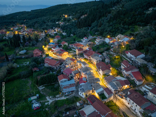 Beautiful view of klimatia  village by  night in corfu island, Greece, Aerial drone view