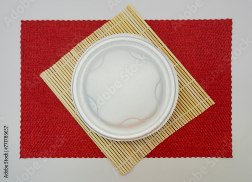 Traditional Brazilian marmitex in packaging with styrofoam lid photo