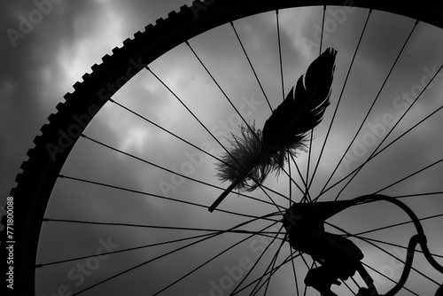 : A lone feather caught in the spokes of a giant bicycle wheel, casting a whimsical silhouette.