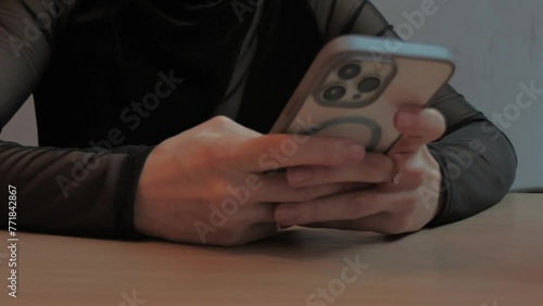 Female enjoying mobile technology and chating. Close-up 