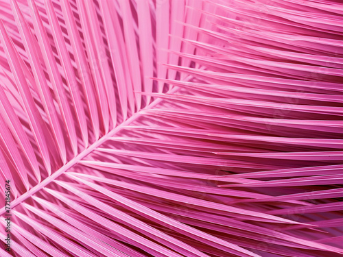 Graphic design space: Pink palm leaf pattern texture with vintage tone filter.