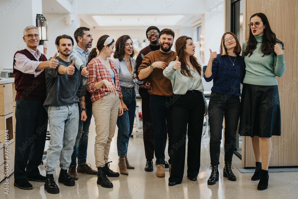 Obraz premium An inclusive team of businesspeople showing approval with thumbs up in a bright office environment, signaling positivity and agreement.