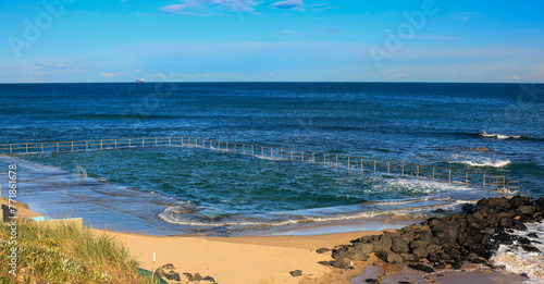 Towradgi Rock Pool north of Wollongong, NSW, Australia. Artificial swimming pool created amongst rocky outcrop of Pacific Ocean. 